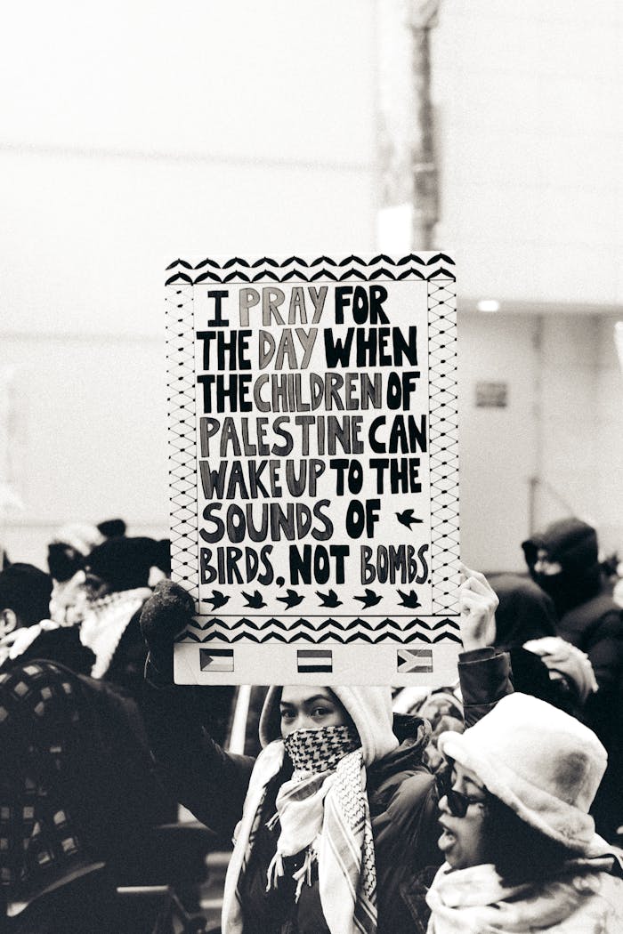 Women with Banner Protesting on Street